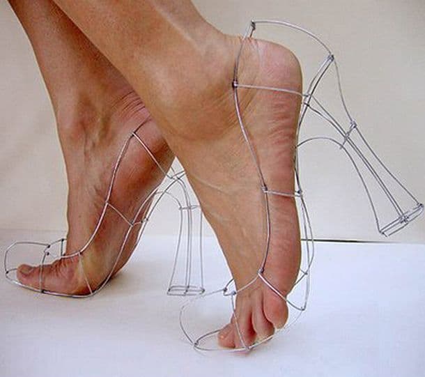 Lady wearing wire framed shoes