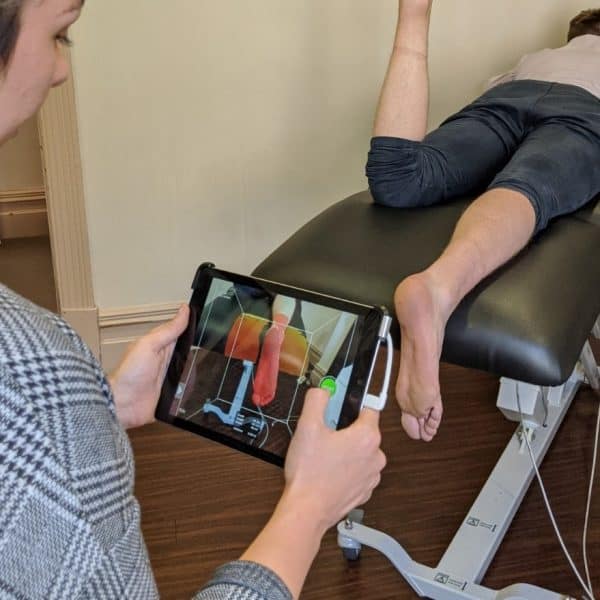 Scanning foot contour for orthotics at Posture Podiatry Adelaide