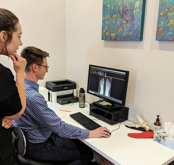 Podiatrists review x-rays at Posture Podiatry
