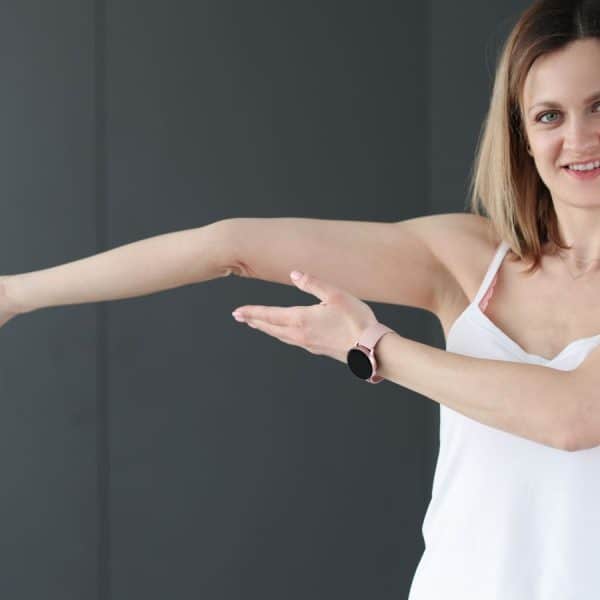 Lady displaying a hypermobile elbow joint