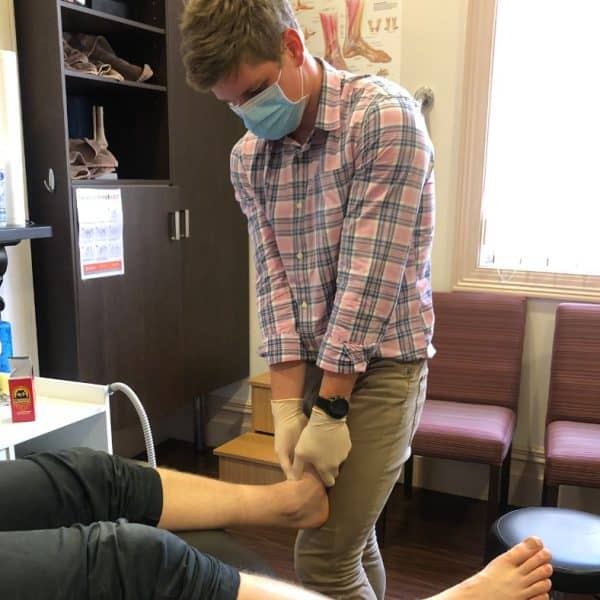 Adelaide Podiatrist, Will Duncan, mobilising feet and ankles