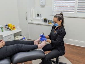 Tessa Coleman, Adelaide Podiatrist, providing general footcare.