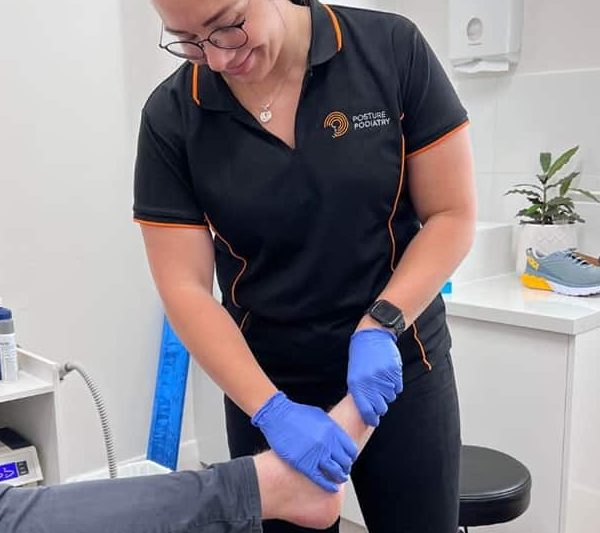 Adelaide Podiatrist, Tess Clisby, using foot and leg mobilisation